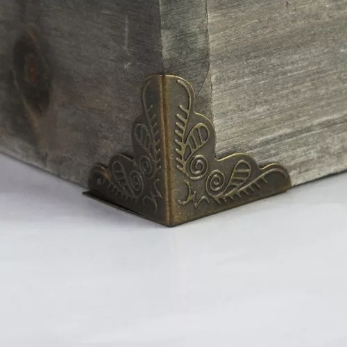 Fém sarkokvédő elem + szögek 8db/csomag